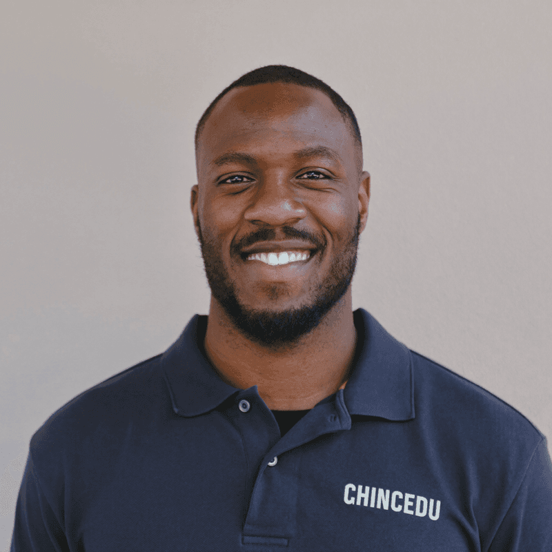 Portrait of a plumber in a navy work polo
