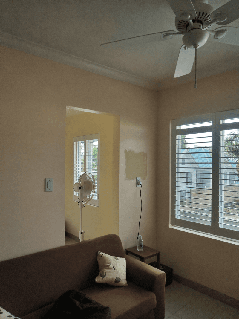 A freshly painted living room with a new wall socket in a Port Harcourt apartment